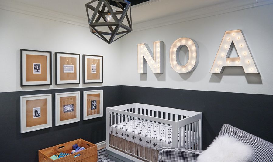 Modern NOA nursery room with grey accents